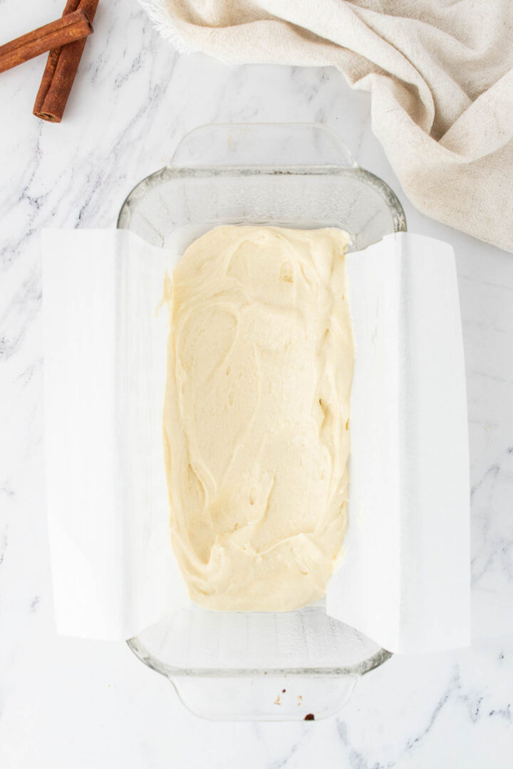 batter spread out in a glass pan